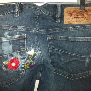 Diesel industry floral patch jeans.